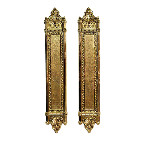 Light vintage brass door push plate for hotel entryways