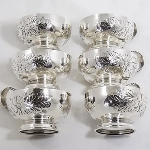 Silver plated pots polished to a bright shine